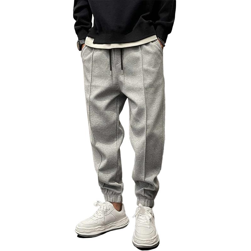 Comfortabele Losse Sportbroek voor Heren van Warm Polyester met Elastische Taille en Functionele Zakken 1