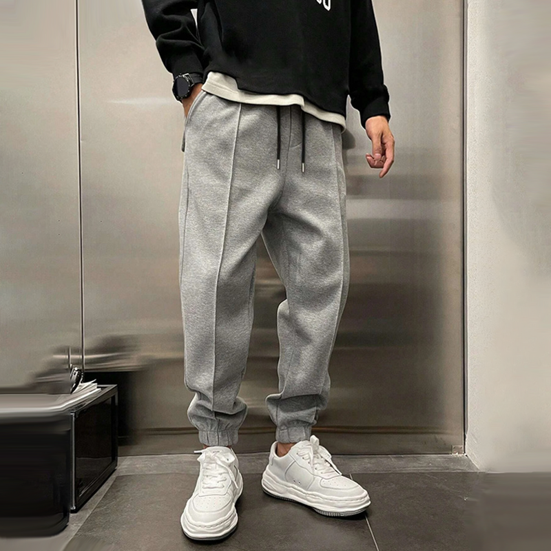 Comfortabele Losse Sportbroek voor Heren van Warm Polyester met Elastische Taille en Functionele Zakken 2