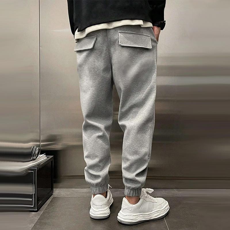 Comfortabele Losse Sportbroek voor Heren van Warm Polyester met Elastische Taille en Functionele Zakken 3