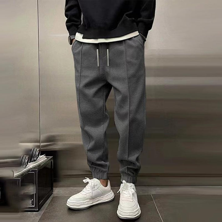 Comfortabele Losse Sportbroek voor Heren van Warm Polyester met Elastische Taille en Functionele Zakken 7