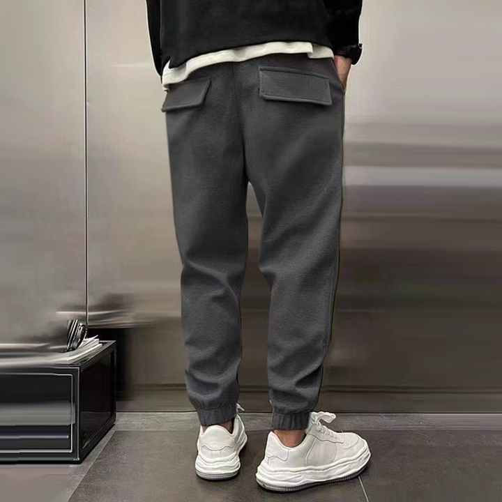 Comfortabele Losse Sportbroek voor Heren van Warm Polyester met Elastische Taille en Functionele Zakken 8
