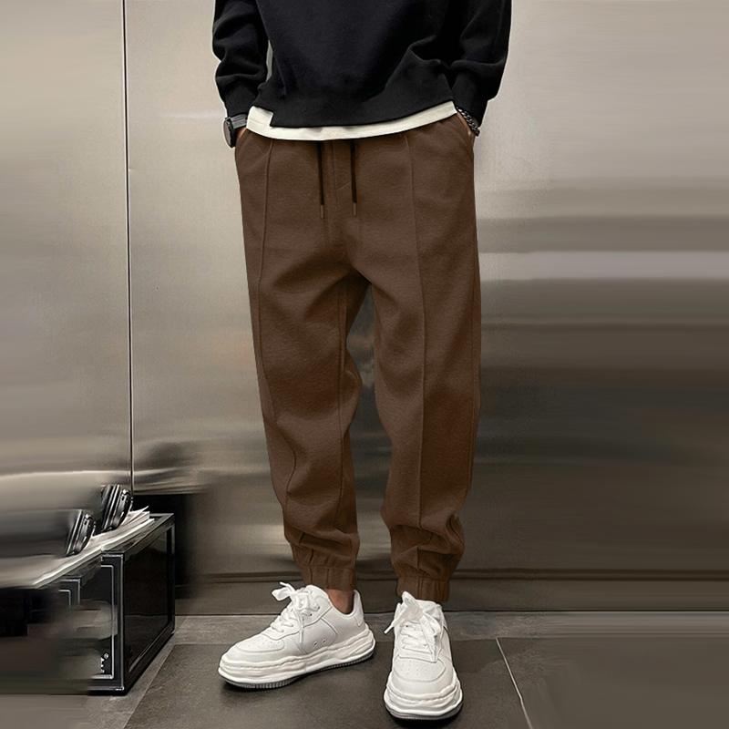 Comfortabele Losse Sportbroek voor Heren van Warm Polyester met Elastische Taille en Functionele Zakken 9